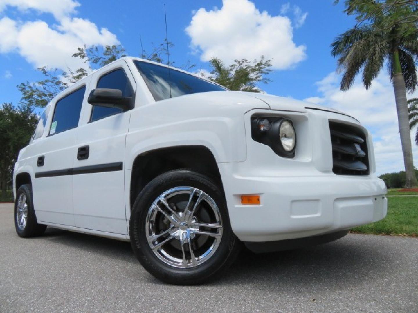 2012 White /Black with an 4.6L V8 engine, Automatic transmission, located at 4301 Oak Circle #19, Boca Raton, FL, 33431, (954) 561-2499, 26.388861, -80.084038 - You are looking at a Gorgeous 2012 Mobility Ventures MV1 Handicap Wheelchair Conversion Van with 64K Original Miles, 4.6L Ford V8, Bleack Leather Type Interior, Alloy Wheels, Power Side Entry Wheelchair Lift with Long Ramp and Short Ramp Function, Q Lock 150 EZ Lock, L-Track Tie Down System, Back Up - Photo#2